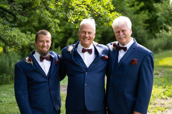 Gary with family at a wedding